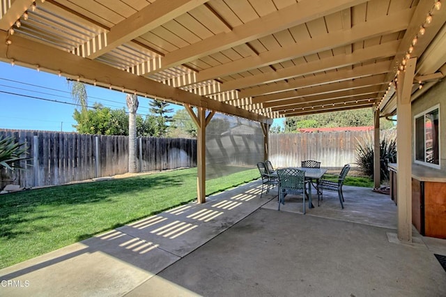 view of patio / terrace with outdoor dining area, a fenced backyard, and a pergola