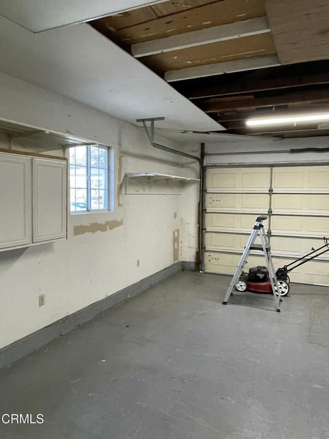 garage with baseboards