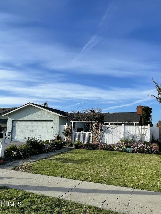 ranch-style house with a garage, a front yard, fence, and stucco siding