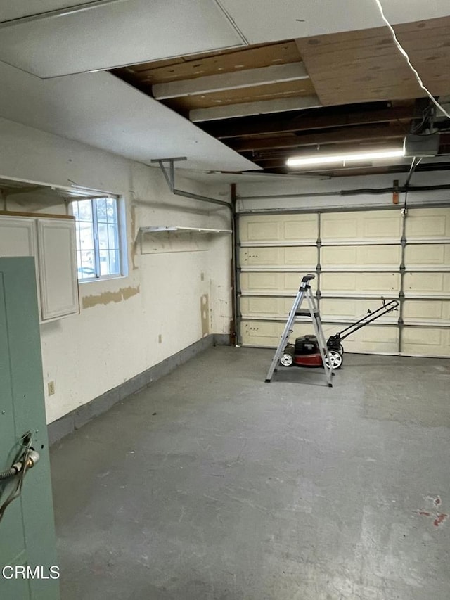 garage with baseboards