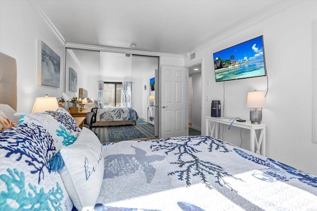 bedroom featuring a closet and ornamental molding