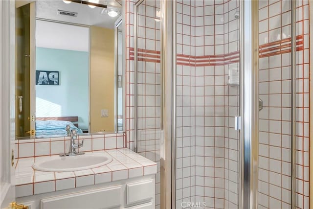 22537 N Summit Ridge Cir, Chatsworth, CA 91311 - ensuite bathroom featuring vanity and a shower stall