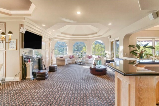 22537 N Summit Ridge Cir, Chatsworth, CA 91311 - carpeted living room with a tray ceiling, recessed lighting, crown molding, and baseboards