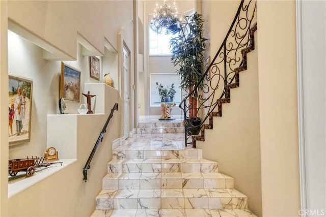 22537 N Summit Ridge Cir, Chatsworth, CA 91311 - stairway with a chandelier and marble finish floors