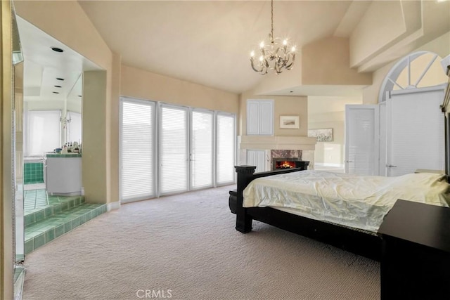 22537 N Summit Ridge Cir, Chatsworth, CA 91311 - bedroom featuring access to outside, a chandelier, carpet, a fireplace, and lofted ceiling