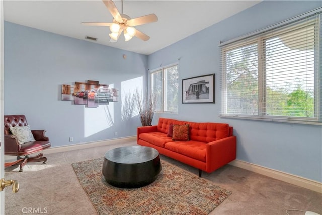 22537 N Summit Ridge Cir, Chatsworth, CA 91311 - carpeted living area with a ceiling fan and baseboards