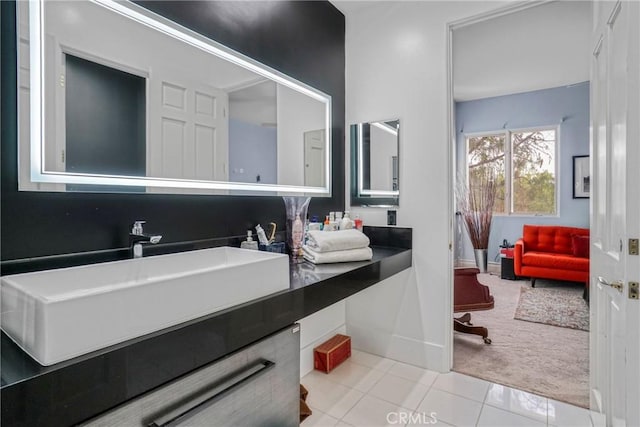 22537 N Summit Ridge Cir, Chatsworth, CA 91311 - bathroom featuring tile patterned floors, vanity, and baseboards