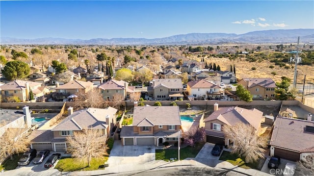 bird's eye view featuring a residential view and a mountain view