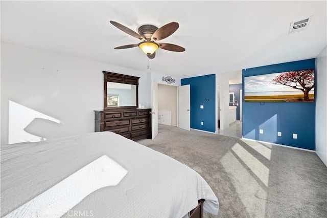 bedroom with visible vents, ceiling fan, and carpet flooring