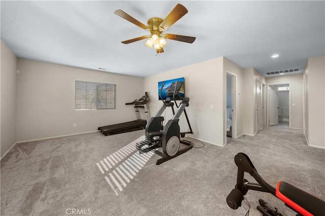 exercise area with ceiling fan, carpet flooring, visible vents, and baseboards