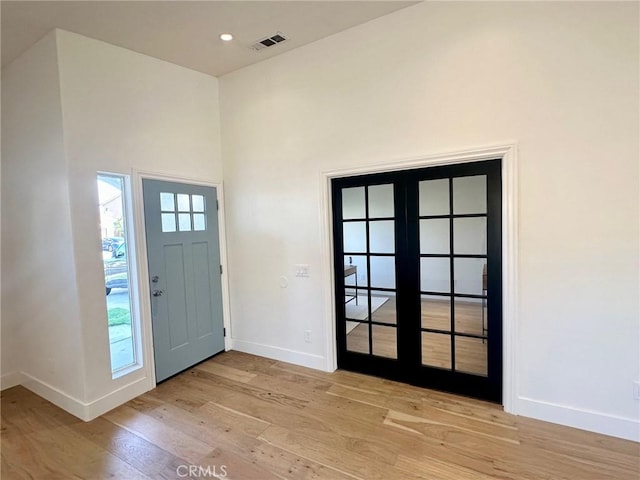 37211 Jerome Ln, Murrieta, CA 92562 - foyer featuring baseboards, light wood finished floors, french doors, and recessed lighting