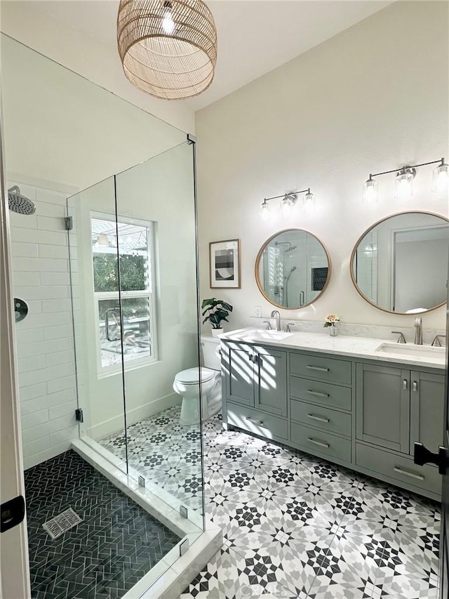 37211 Jerome Ln, Murrieta, CA 92562 - full bath featuring a shower stall, double vanity, toilet, and tile patterned flooring