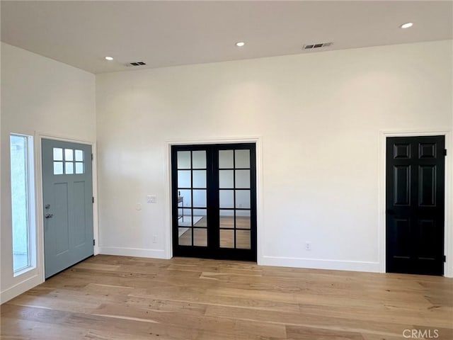37211 Jerome Ln, Murrieta, CA 92562 - entrance foyer with french doors, light wood-style floors, baseboards, and recessed lighting