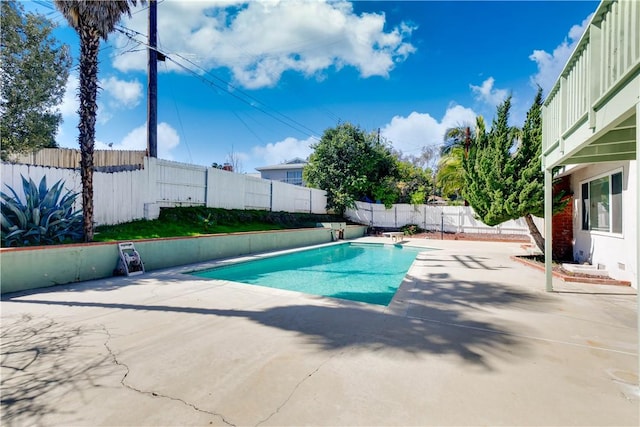 view of swimming pool with a patio, a fenced backyard, and a fenced in pool