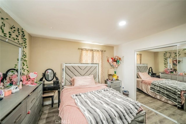 bedroom featuring wood finished floors