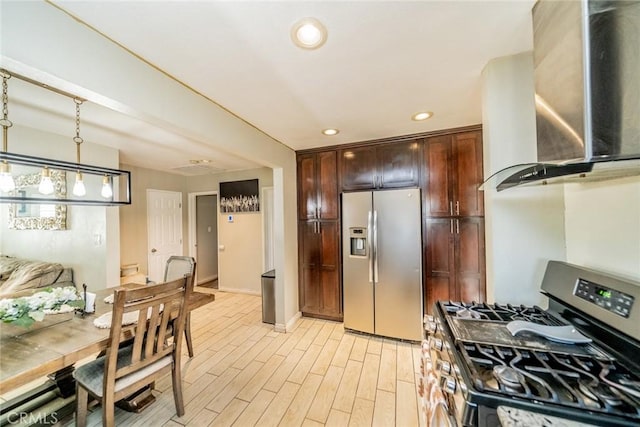 kitchen with recessed lighting, appliances with stainless steel finishes, dark brown cabinetry, wall chimney range hood, and light wood-type flooring