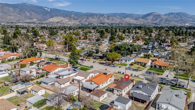 aerial view featuring a residential view and a mountain view