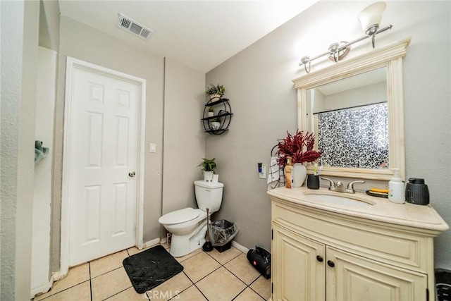 full bathroom with tile patterned flooring, visible vents, vanity, and toilet