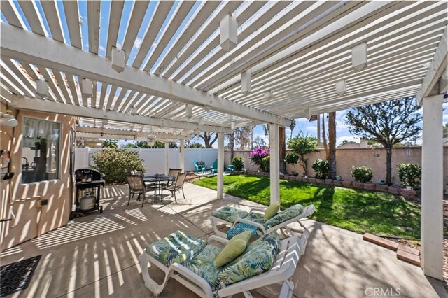 view of patio / terrace featuring outdoor dining space, a fenced backyard, grilling area, and a pergola