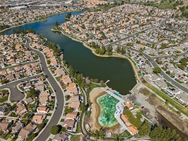 bird's eye view with a water view and a residential view