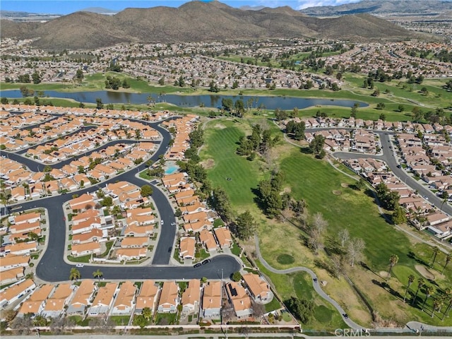 bird's eye view with a residential view and a water and mountain view