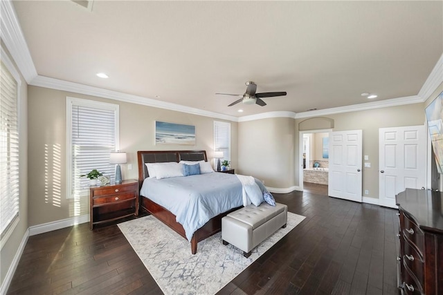 bedroom featuring dark wood finished floors, a ceiling fan, crown molding, and baseboards