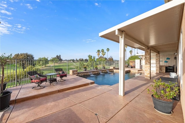 view of swimming pool featuring a fenced in pool, a fenced backyard, and a patio area