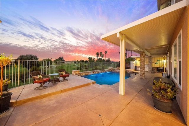 view of swimming pool with a fenced in pool, a patio, and a fenced backyard