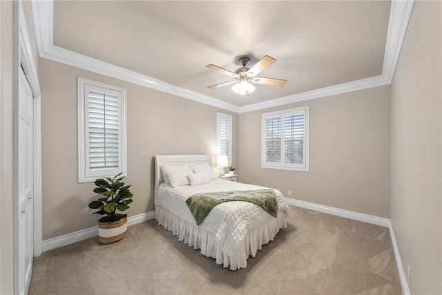 bedroom with light carpet, baseboards, and ornamental molding