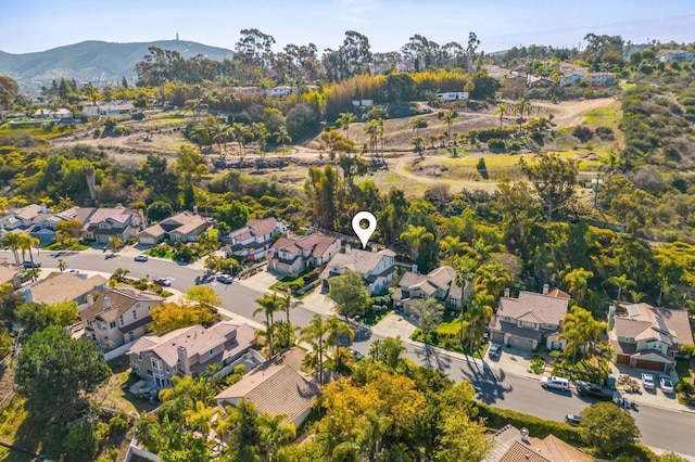 bird's eye view with a residential view and a mountain view