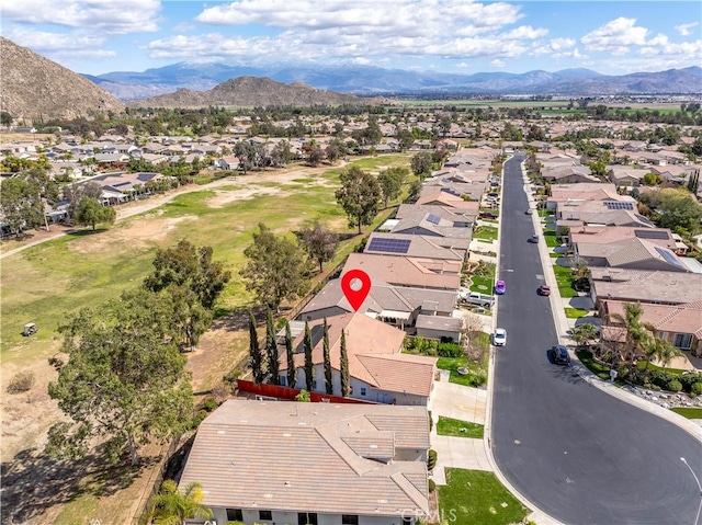 aerial view with a mountain view and a residential view