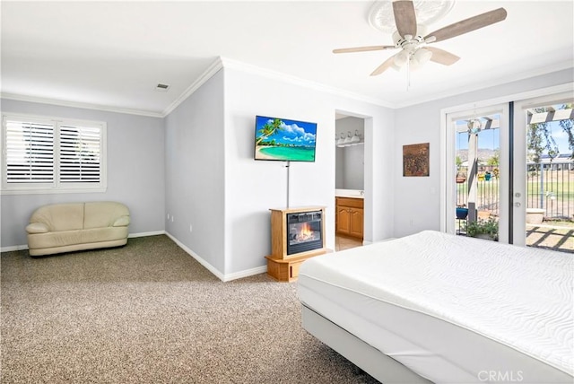 bedroom featuring access to outside, ornamental molding, baseboards, and light colored carpet