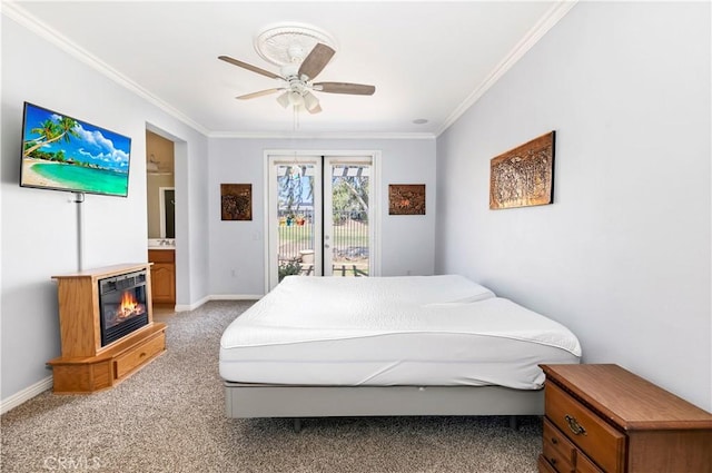 bedroom featuring access to outside, light colored carpet, crown molding, and baseboards