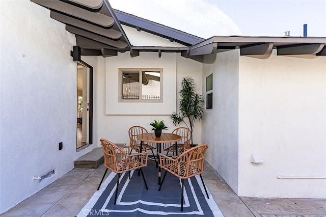 view of patio with outdoor dining area