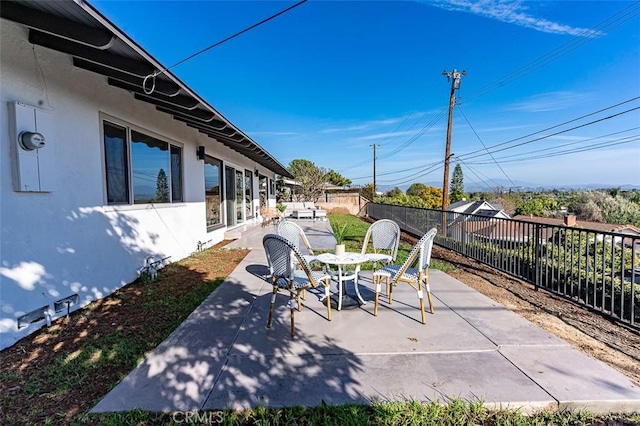 view of patio / terrace featuring a fenced backyard and outdoor dining space