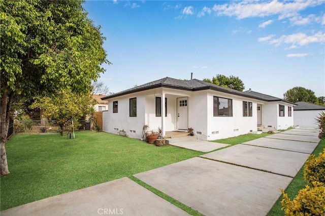 bungalow-style home featuring a front lawn, stucco siding, crawl space, and fence