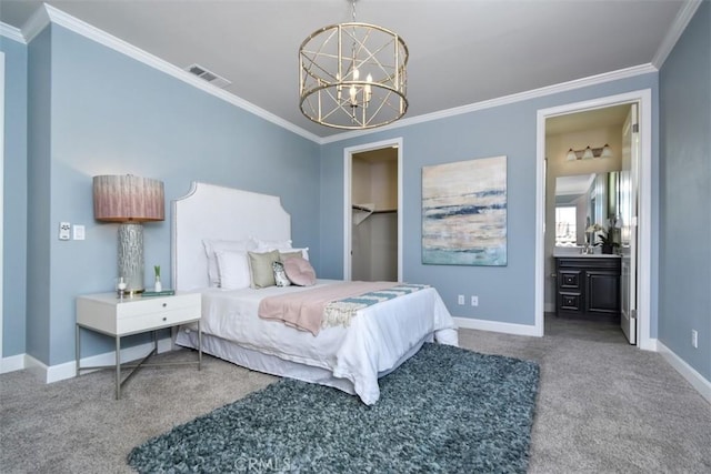 carpeted bedroom featuring baseboards, visible vents, a chandelier, and crown molding