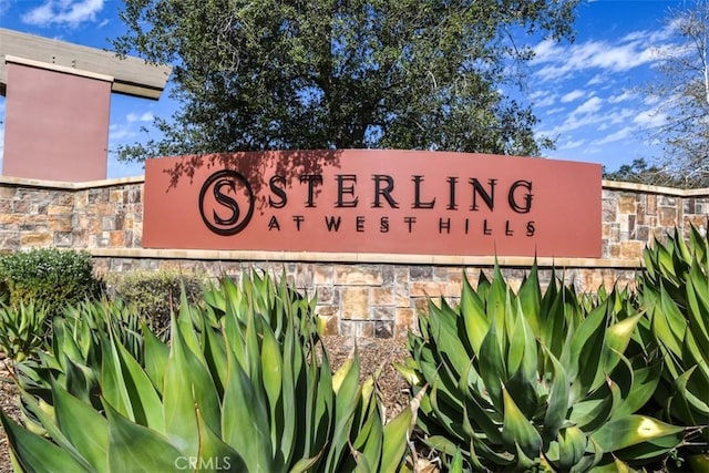 view of community sign