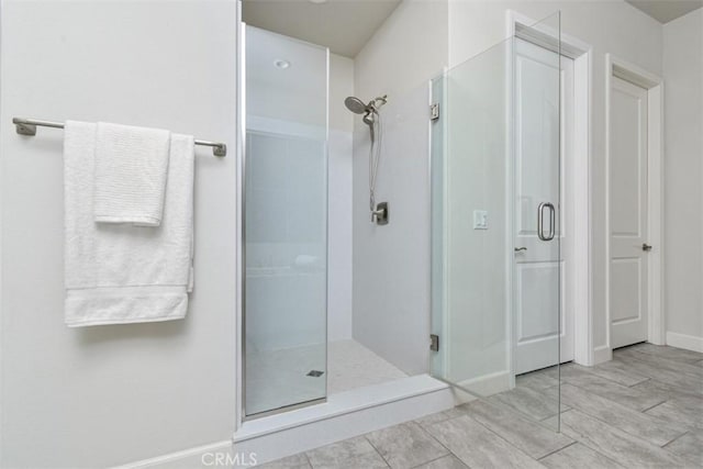 full bathroom featuring a shower stall