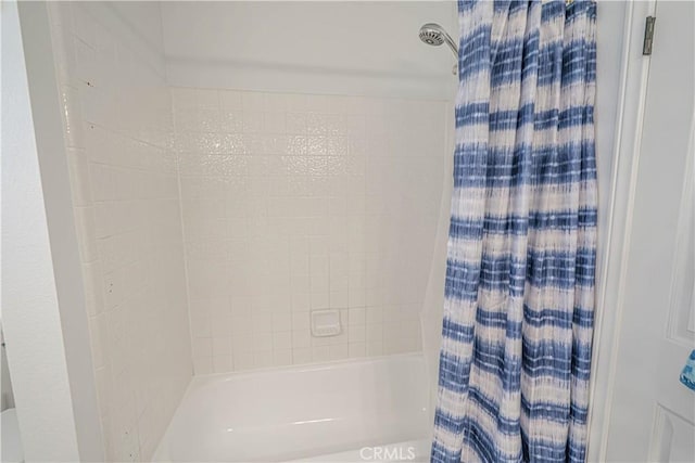 full bathroom featuring shower / tub combo