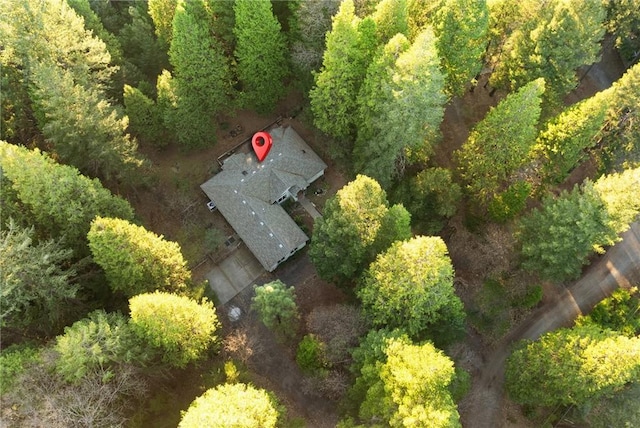 bird's eye view featuring a view of trees