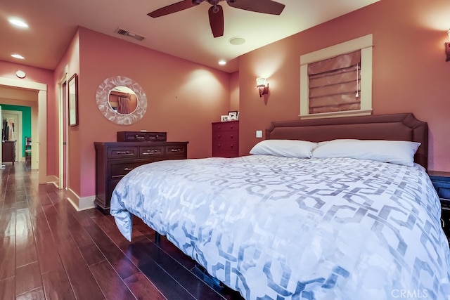 bedroom featuring baseboards, visible vents, a ceiling fan, dark wood-style floors, and recessed lighting