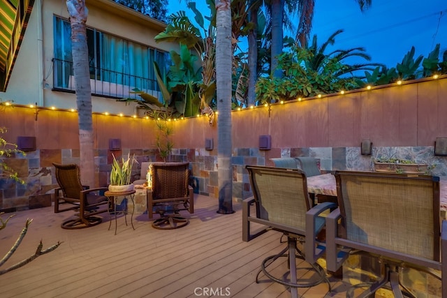 deck with outdoor dining space