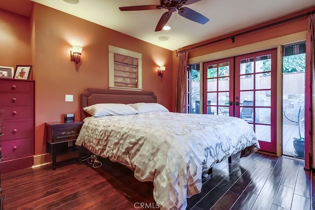 bedroom with a ceiling fan, access to outside, french doors, and dark wood finished floors