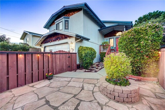 332 Grove St, Los Osos, CA 93402 - view of front facade with a garage