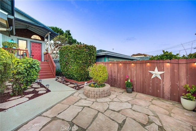 view of patio featuring fence