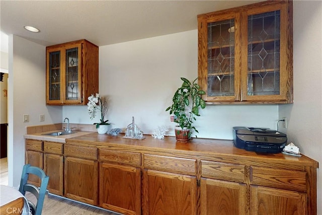 332 Grove St, Los Osos, CA 93402 - bar featuring a sink and light wood-style flooring