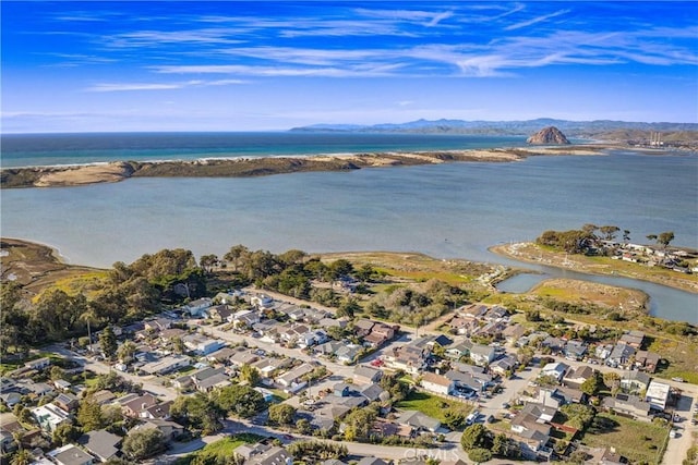 bird's eye view with a water view and a residential view