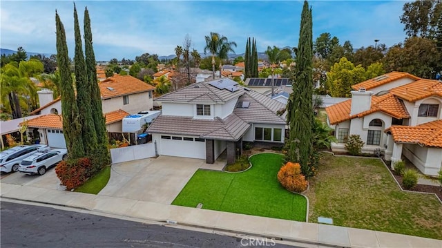 birds eye view of property with a residential view