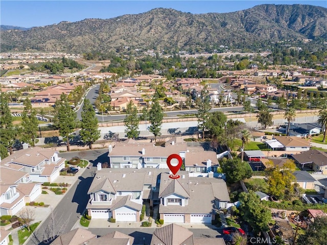 bird's eye view with a residential view and a mountain view